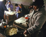 Pasang Norbu Sherpa prepares breakfast in Karta
